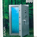[SM 2001] Safe filled with water standing in a forest