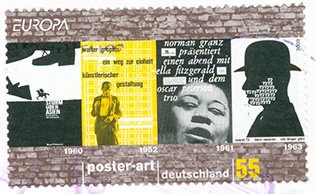 [DE 2003] Four posters on a brick wall